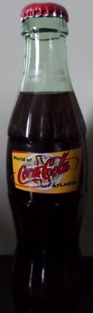 2000-0889 € 15,00 coca cola flesje 8oz world of coca cola Atlanta 10th anniversary world of c.c. 3-8-2000